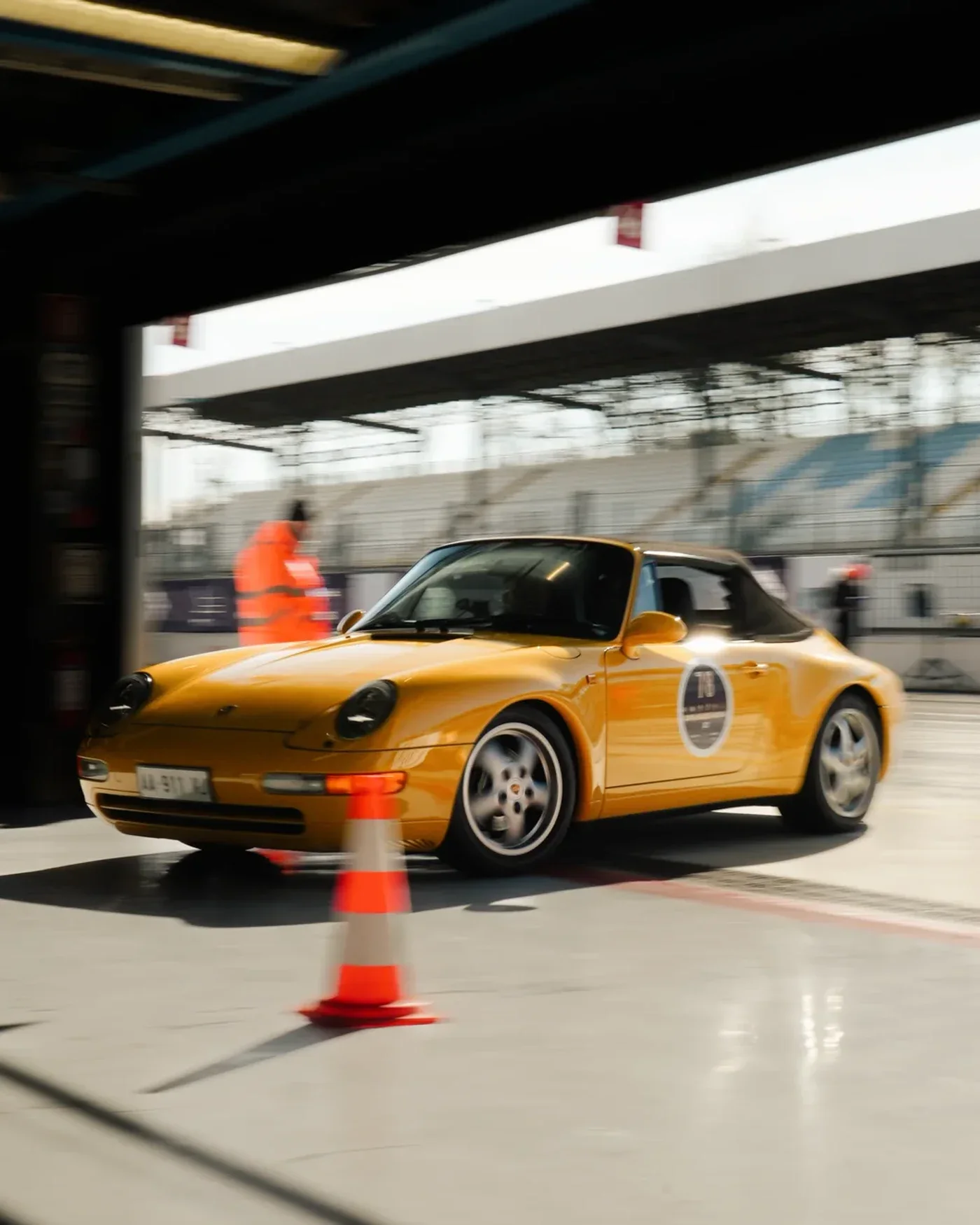 Yellow Porsche on mountain roads during Coppa Milano Sanremo 2026