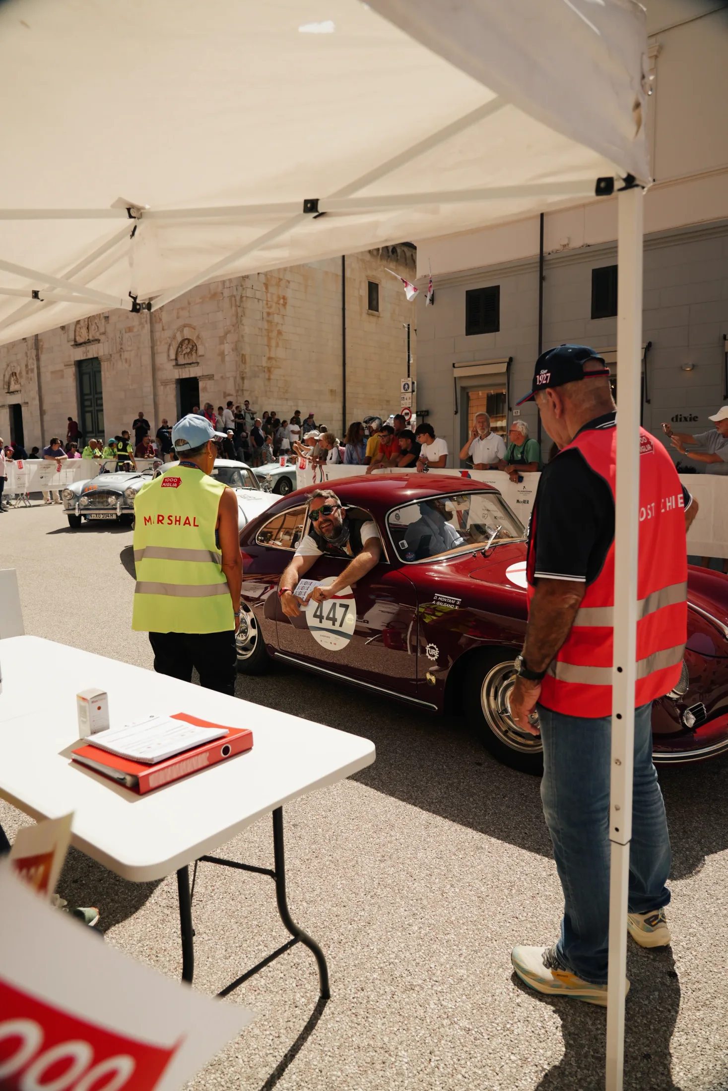 Number 447 at a stamp control during the 1000 Miglia.