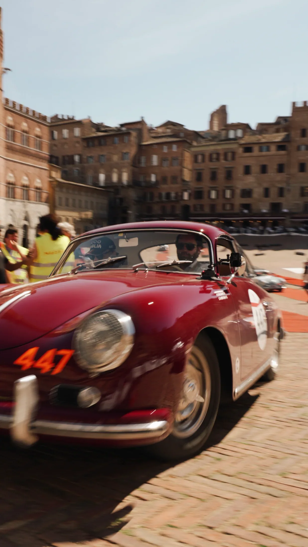 Number 447 moving through an Italian historic square.