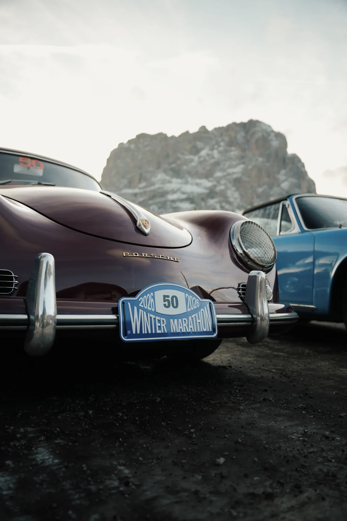 Close detail of the Winter Marathon plate on the Porsche.